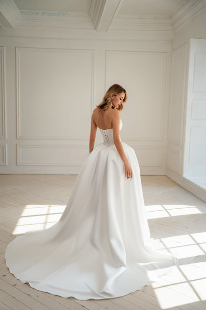 Corset lace-up back detail on strapless wedding ball gown
